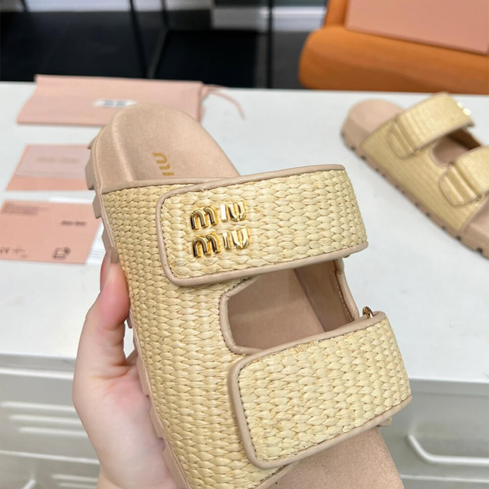 MiuMiu Raffia-effect woven fabric slides